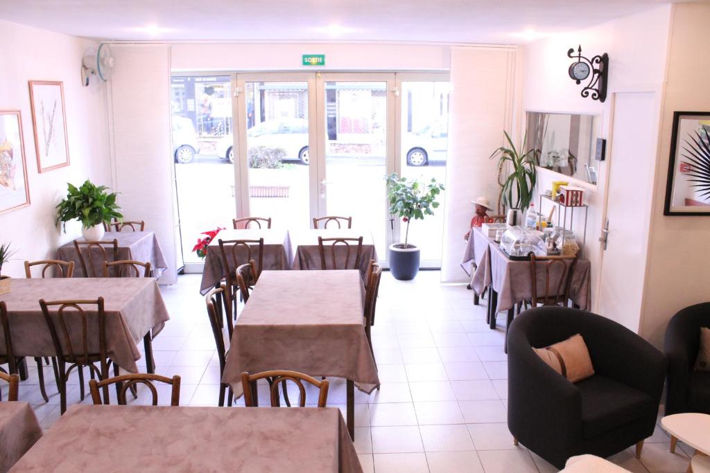Posezení v ubytování Nouvel Hotel