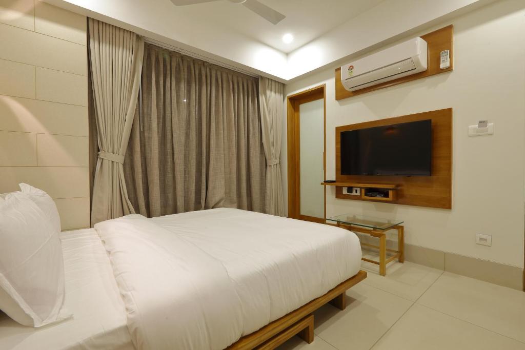 TV a/nebo společenská místnost v ubytování Hotel 440, A Serene Stay