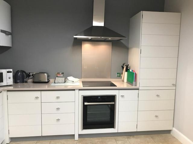 Kuchyň nebo kuchyňský kout v ubytování WM Apartments