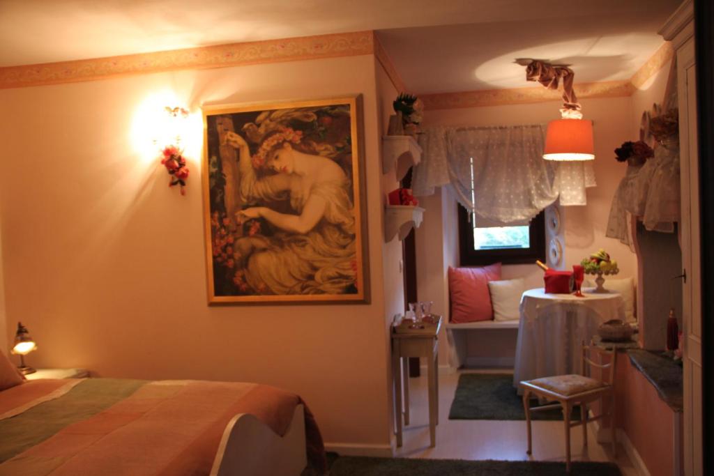 Postel nebo postele na pokoji v ubytování Una Franca Camere Di Charme