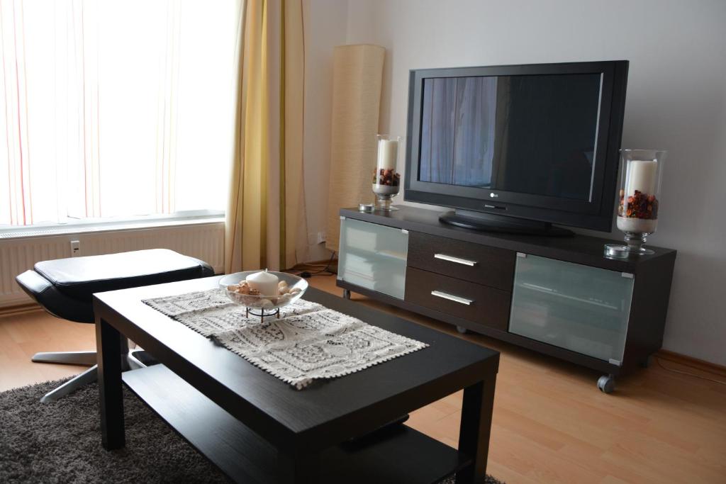 TV a/nebo společenská místnost v ubytování Apartmán Zderadova