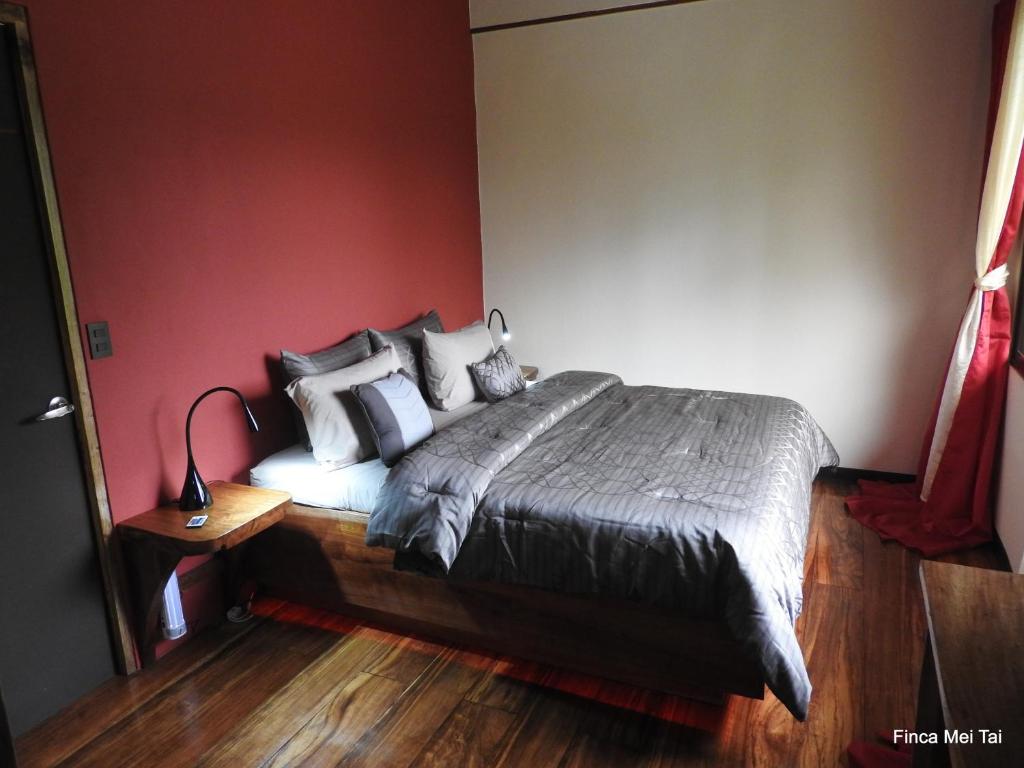 Postel nebo postele na pokoji v ubytování Mei Tai Cacao Lodge