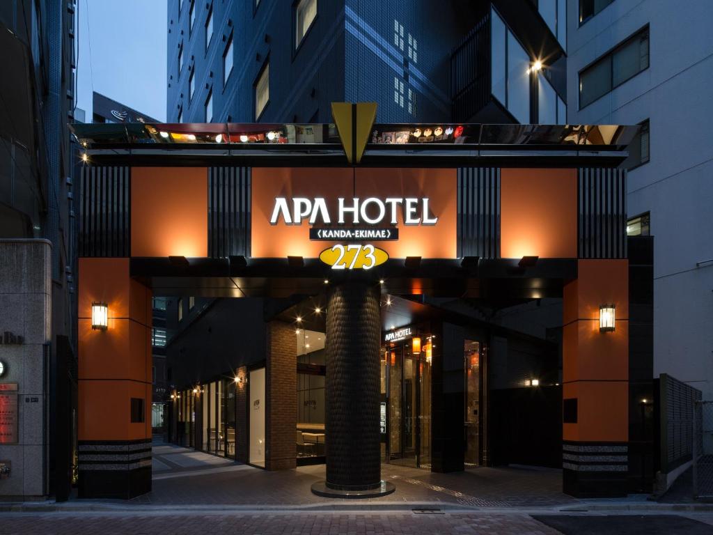 a hotel with a sign that reads apr hotel at APA Hotel Kanda Ekimae in Tokyo