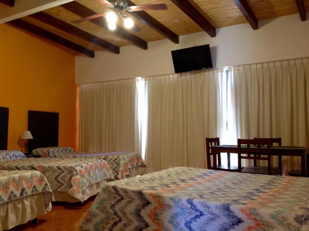 Кровать или кровати в номере Hostería Don Arturo