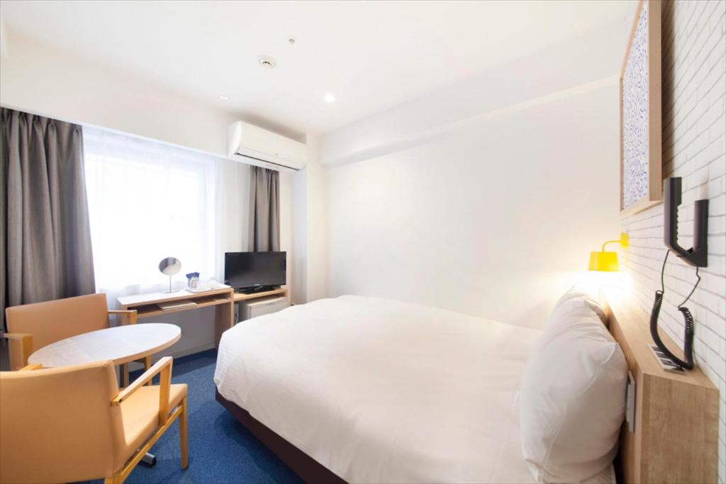 TV a/nebo společenská místnost v ubytování Hotel Plumm