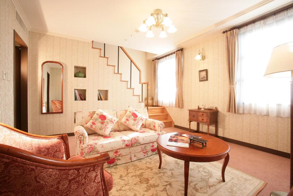 Posezení v ubytování Kitabiwako Hotel Grazie
