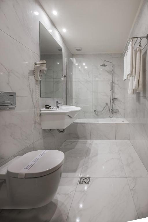 Koupelna v ubytování Rex Hotel