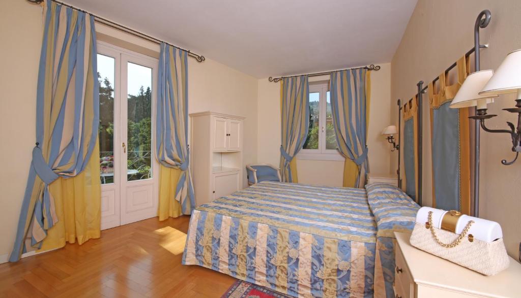 Postel nebo postele na pokoji v ubytování Villa Sofia Hotel