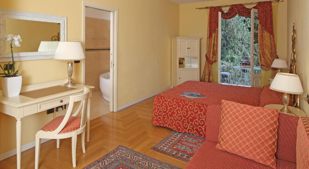 Postel nebo postele na pokoji v ubytování Villa Sofia Hotel