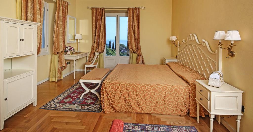 Postel nebo postele na pokoji v ubytování Villa Sofia Hotel
