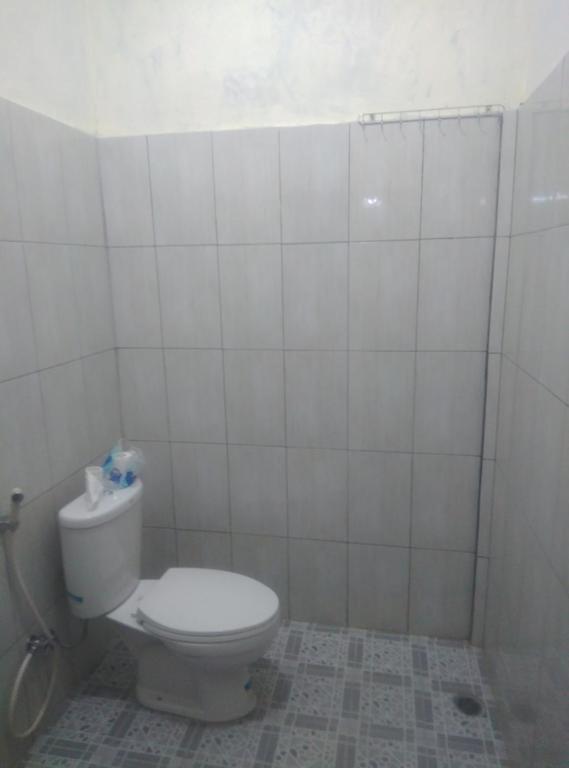 Koupelna v ubytování Pedek Homestay