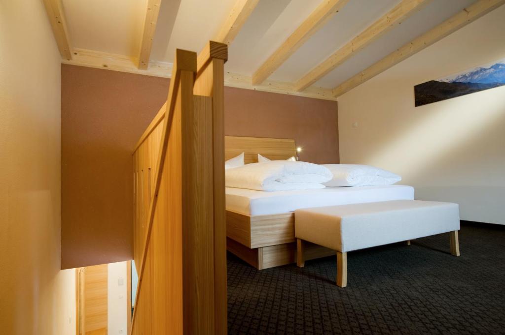 Postel nebo postele na pokoji v ubytování Hotel Ostaria Posta