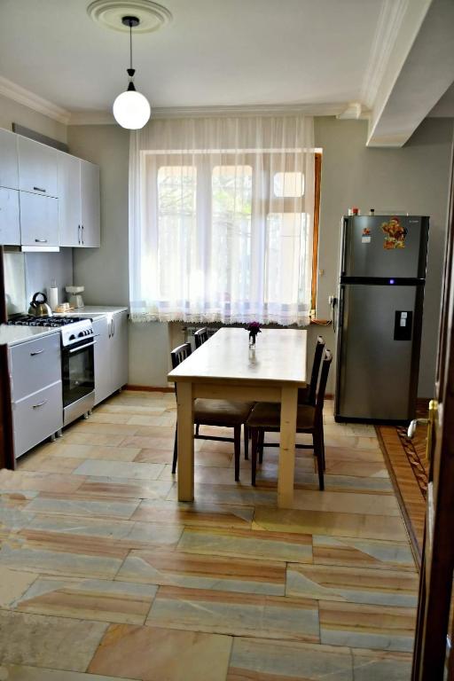 Kuchyň nebo kuchyňský kout v ubytování Hotel Good Luck