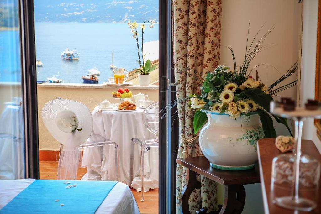 Postel nebo postele na pokoji v ubytování Hotel La Torre