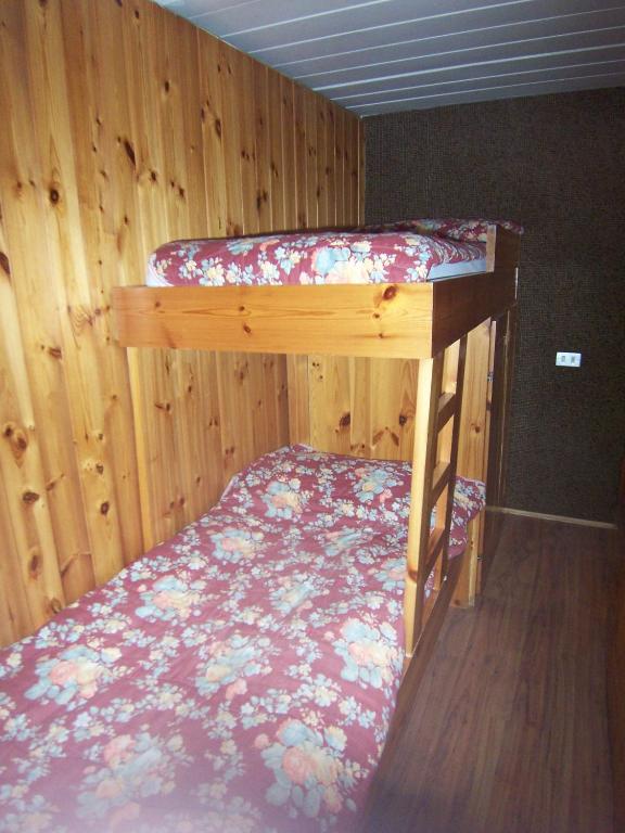 Postel nebo postele na pokoji v ubytování Res. Marilleva 1400 Apt.Solandra