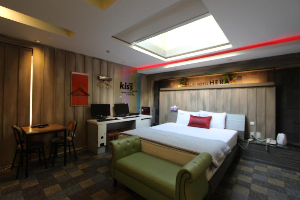 Postel nebo postele na pokoji v ubytování Hera Hotel