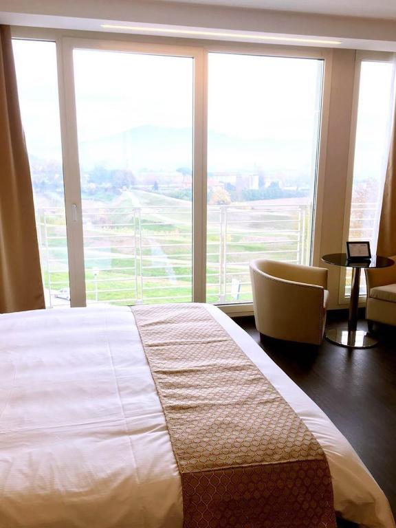 Posteľ alebo postele v izbe v ubytovaní Hotel Datini