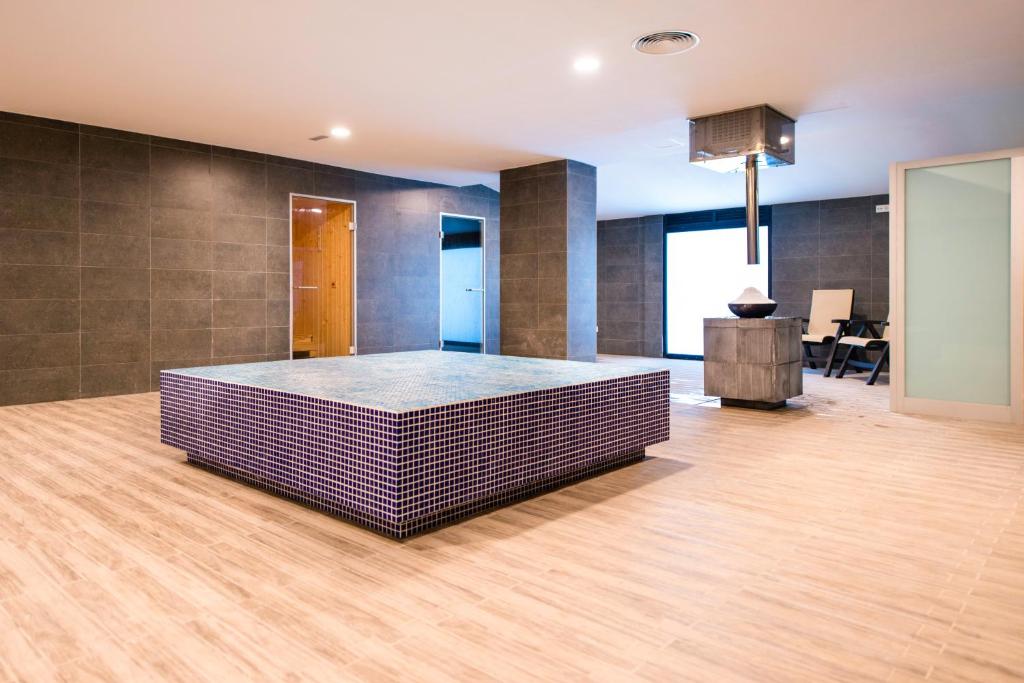 Postel nebo postele na pokoji v ubytování Kn Hotel Matas Blancas - Solo Adultos