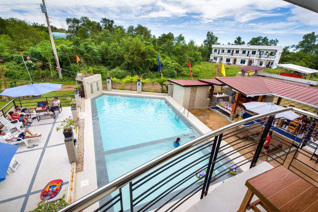 Bazén v ubytování Greenfields Tourist Inn nebo v jeho okolí