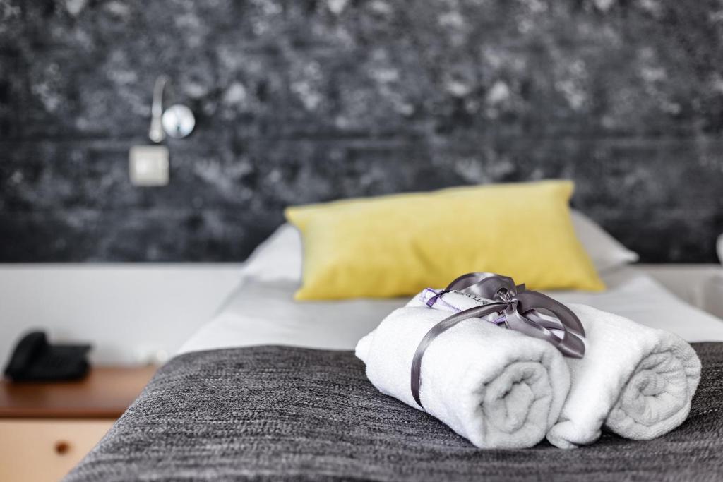 Posteľ alebo postele v izbe v ubytovaní Hotel Punta