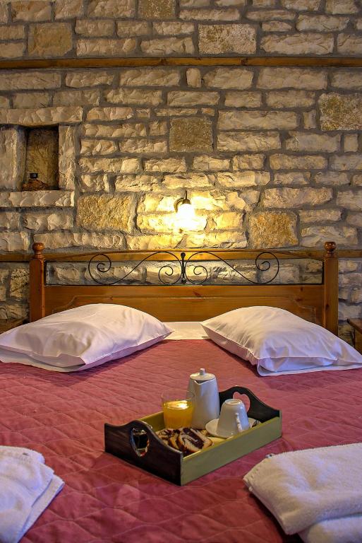 Postel nebo postele na pokoji v ubytování Guesthouse Gonia