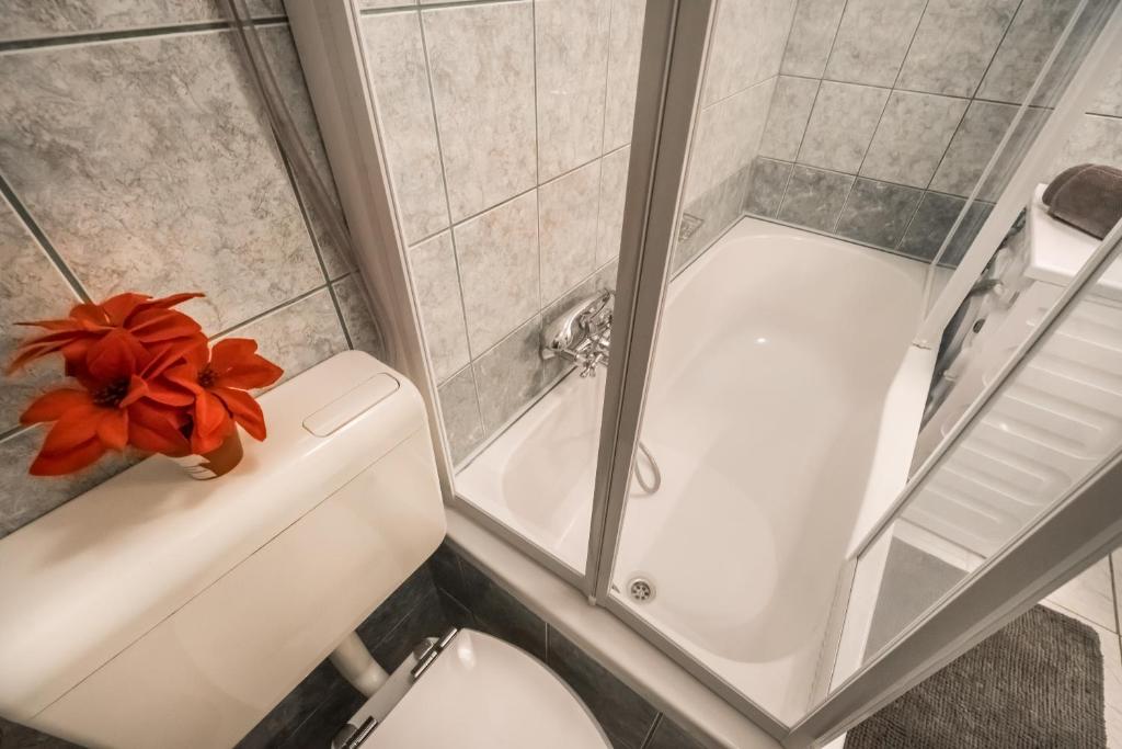 Koupelna v ubytování BpR Orange Dream Apartment