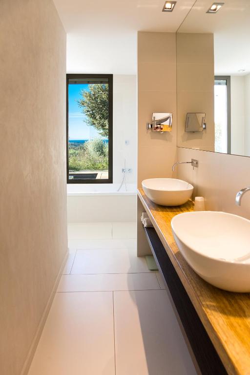 Koupelna v ubytování Hôtel Cala di Greco