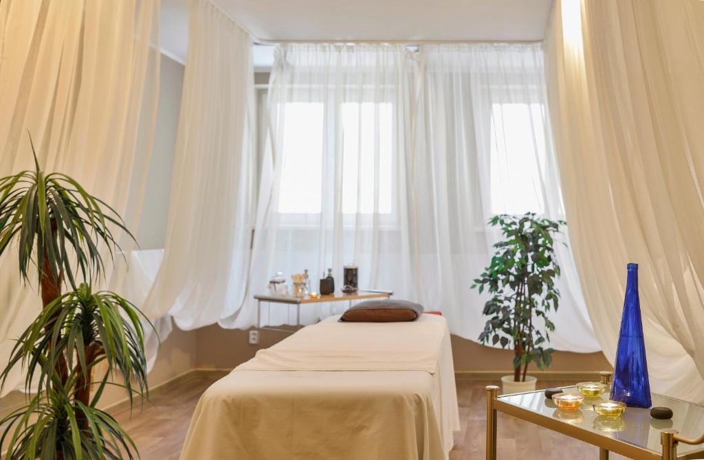 Postel nebo postele na pokoji v ubytování Hotel Continental