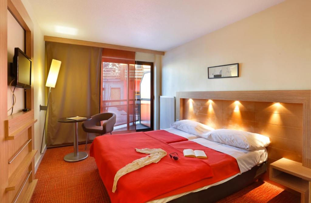 Postel nebo postele na pokoji v ubytování Suite Home Briancon Serre Chevalier