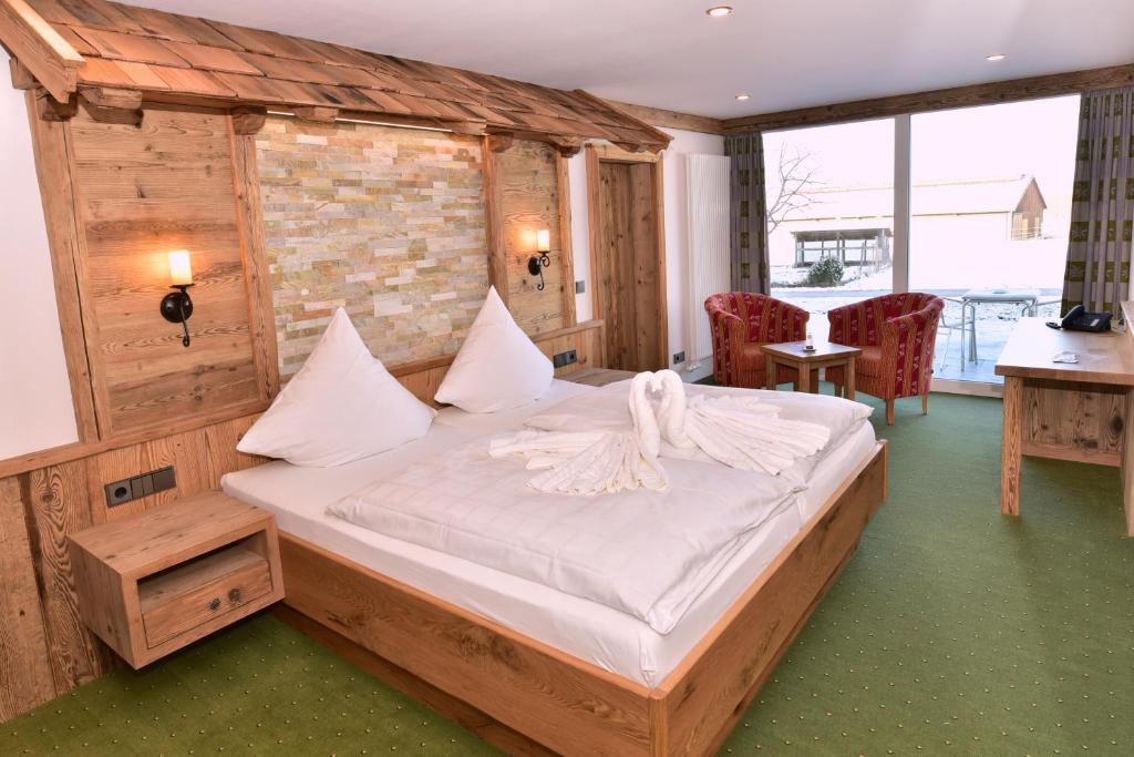 Postel nebo postele na pokoji v ubytování Hotel Wender
