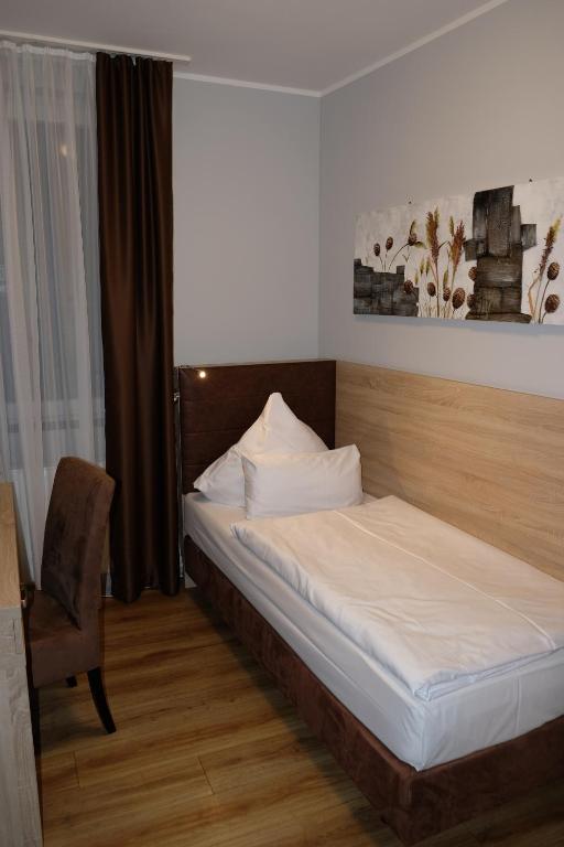 Postel nebo postele na pokoji v ubytování Minx – CityHotels