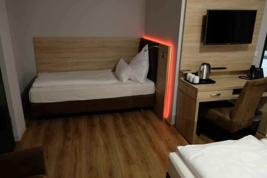 Postel nebo postele na pokoji v ubytování Minx – CityHotels