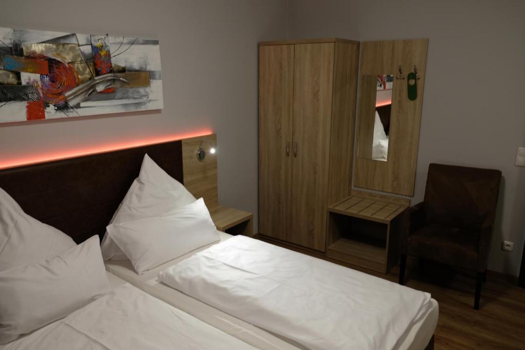 Postel nebo postele na pokoji v ubytování Minx – CityHotels