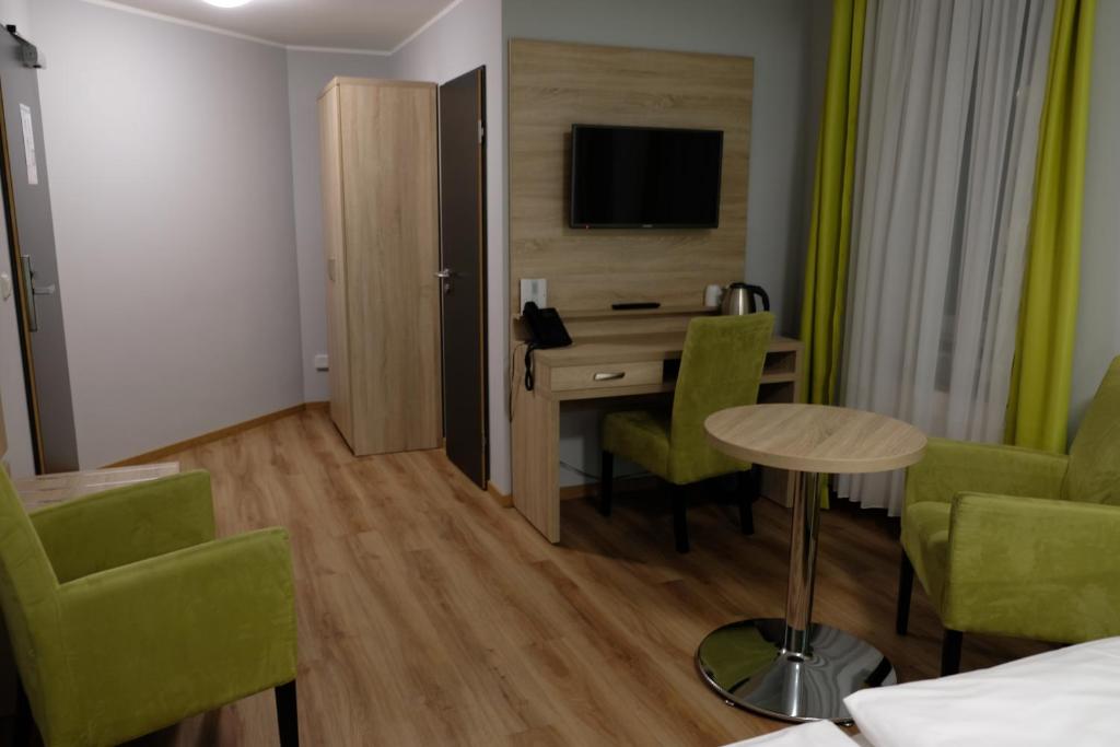 TV a/nebo společenská místnost v ubytování Minx – CityHotels
