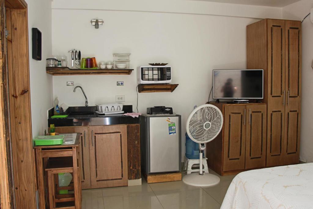 Kuchyň nebo kuchyňský kout v ubytování Hospedaje Solymar Sarie Bay