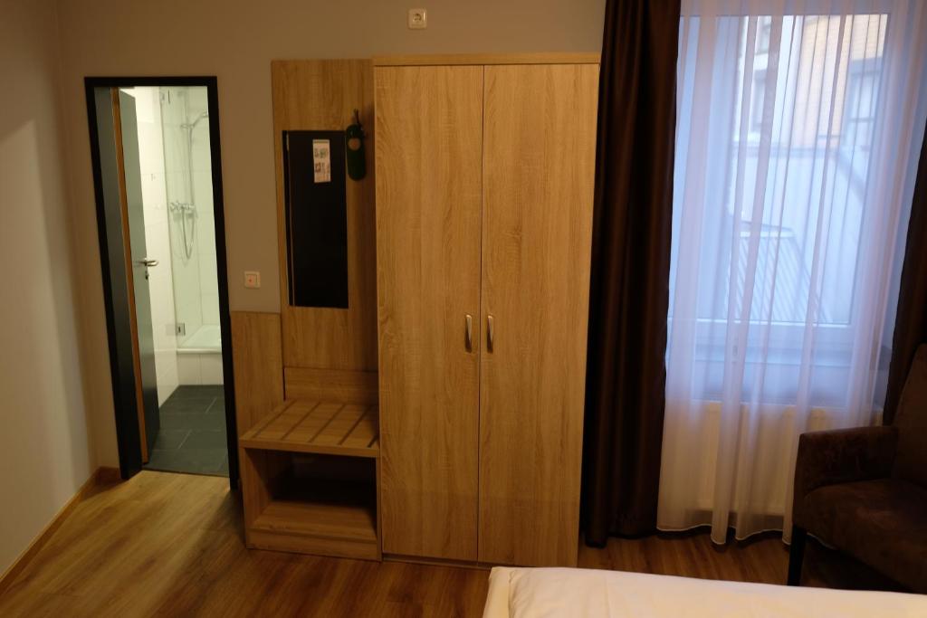 Postel nebo postele na pokoji v ubytování Minx – CityHotels