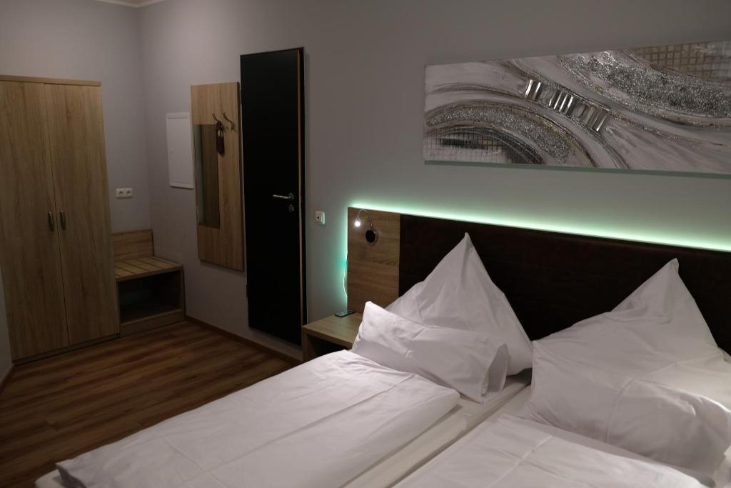 Postel nebo postele na pokoji v ubytování Minx – CityHotels