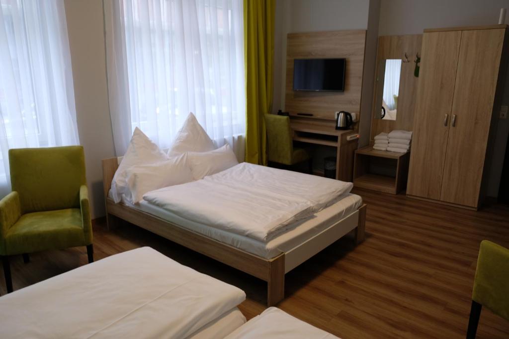 Postel nebo postele na pokoji v ubytování Minx – CityHotels