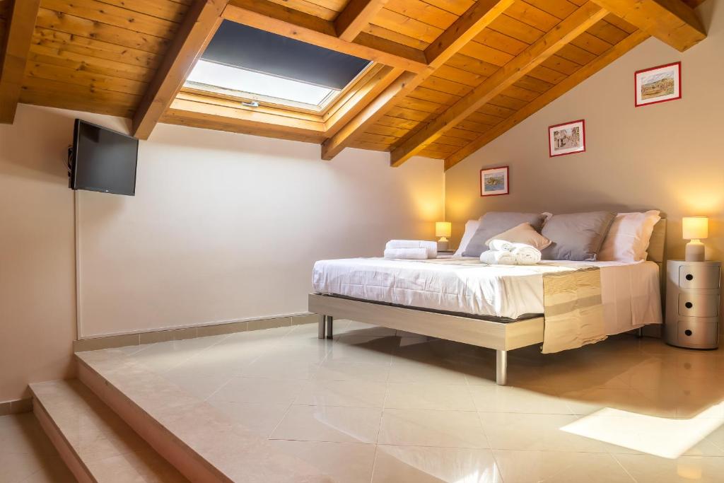 Posteľ alebo postele v izbe v ubytovaní Amartìa Apartments