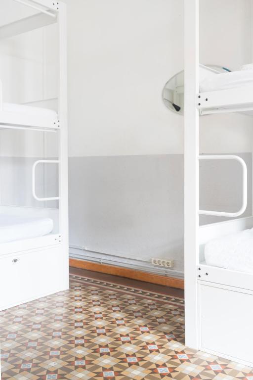Posteľ alebo postele v izbe v ubytovaní Soul Backpackers Barcelona
