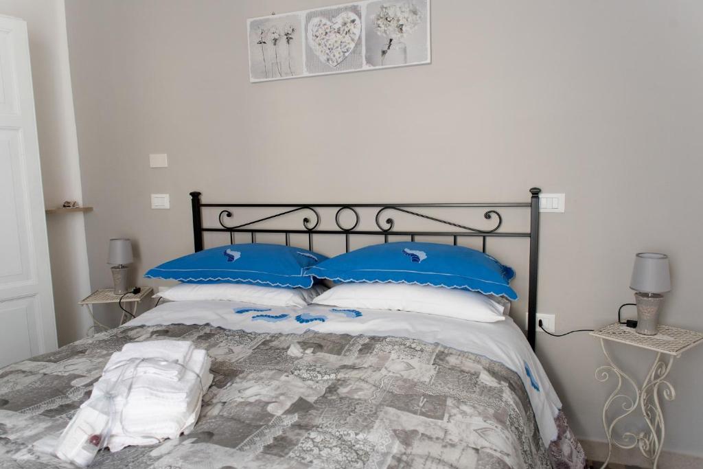 Postel nebo postele na pokoji v ubytování B&B" del Castello"