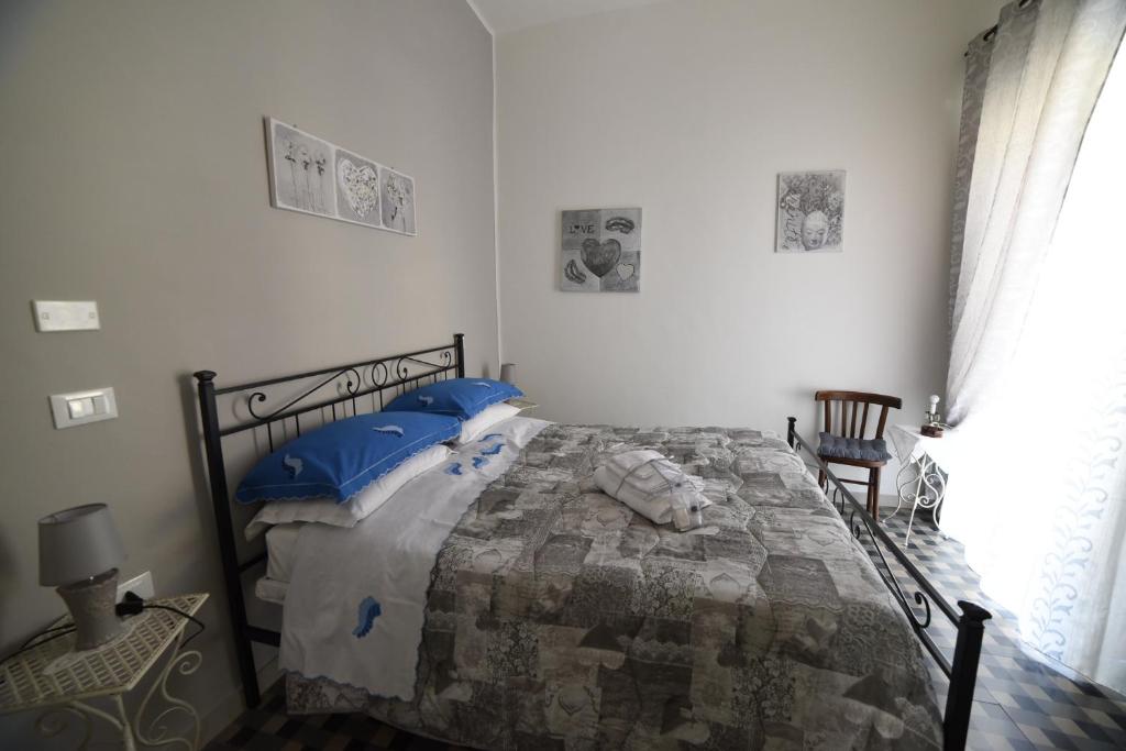 Postel nebo postele na pokoji v ubytování B&B" del Castello"