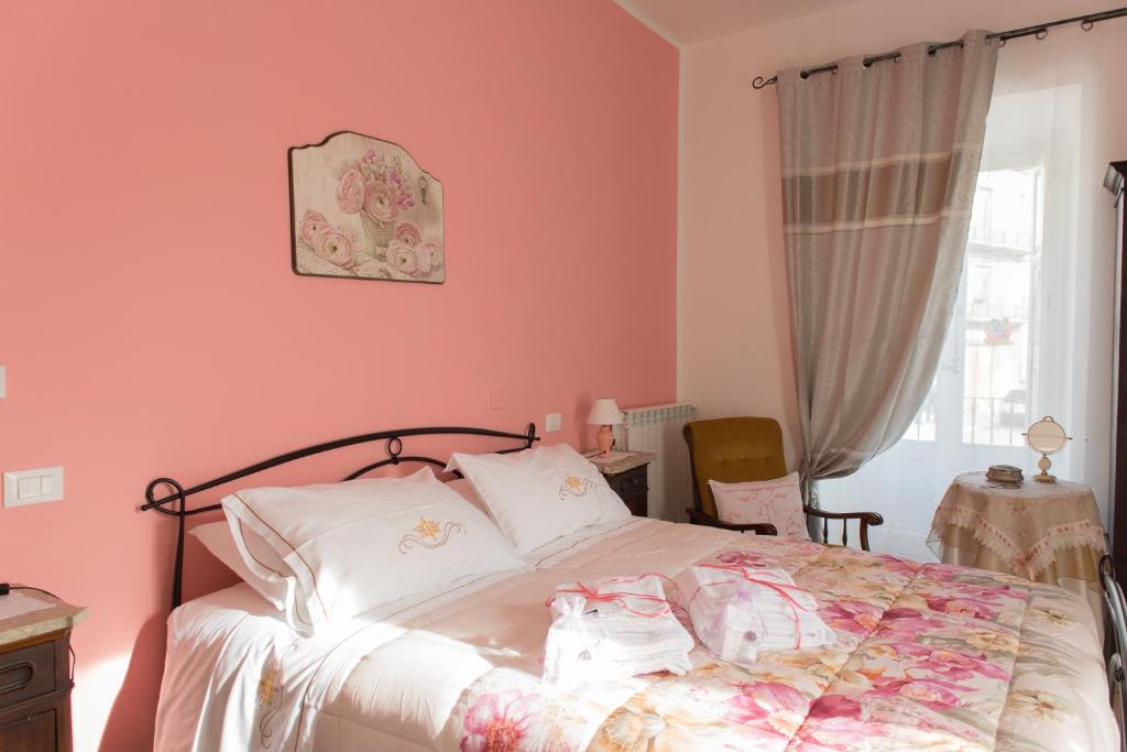 Postel nebo postele na pokoji v ubytování B&B" del Castello"
