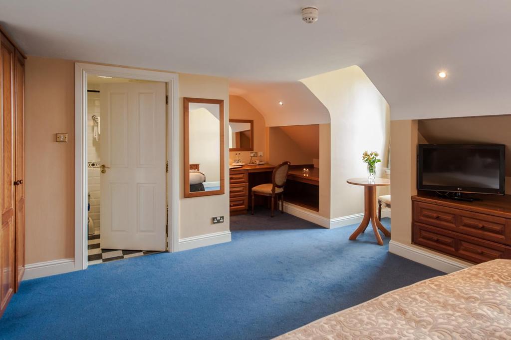 Voodi või voodid majutusasutuse Blarney Castle Hotel toas