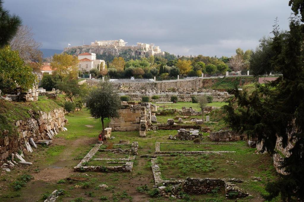 a view of the ruins of the ancient city at Tranquil Central Apt, behind Athens Caravel Area in Athens