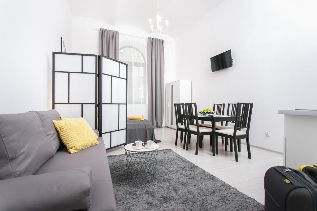 Televízia a/alebo spoločenská miestnosť v ubytovaní Krakow B&B - Old Town