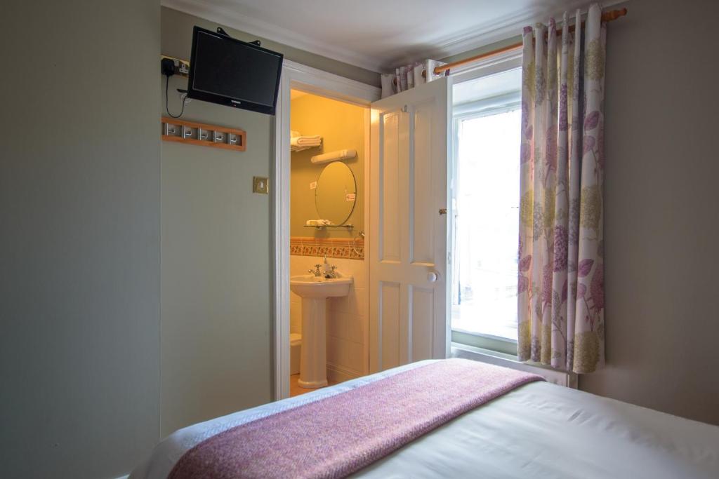 Postel nebo postele na pokoji v ubytování Brennan's Accommodation Glenties