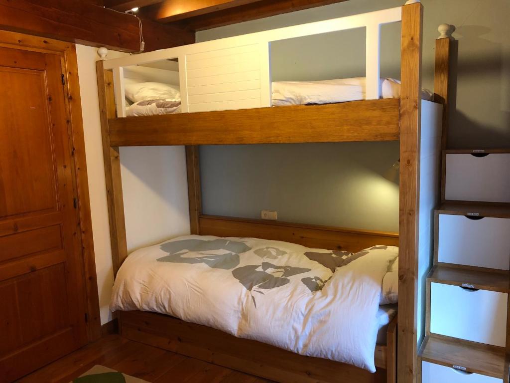 Posteľ alebo postele v izbe v ubytovaní Casa de piedra con encanto en el bonito pueblo de Bagergue