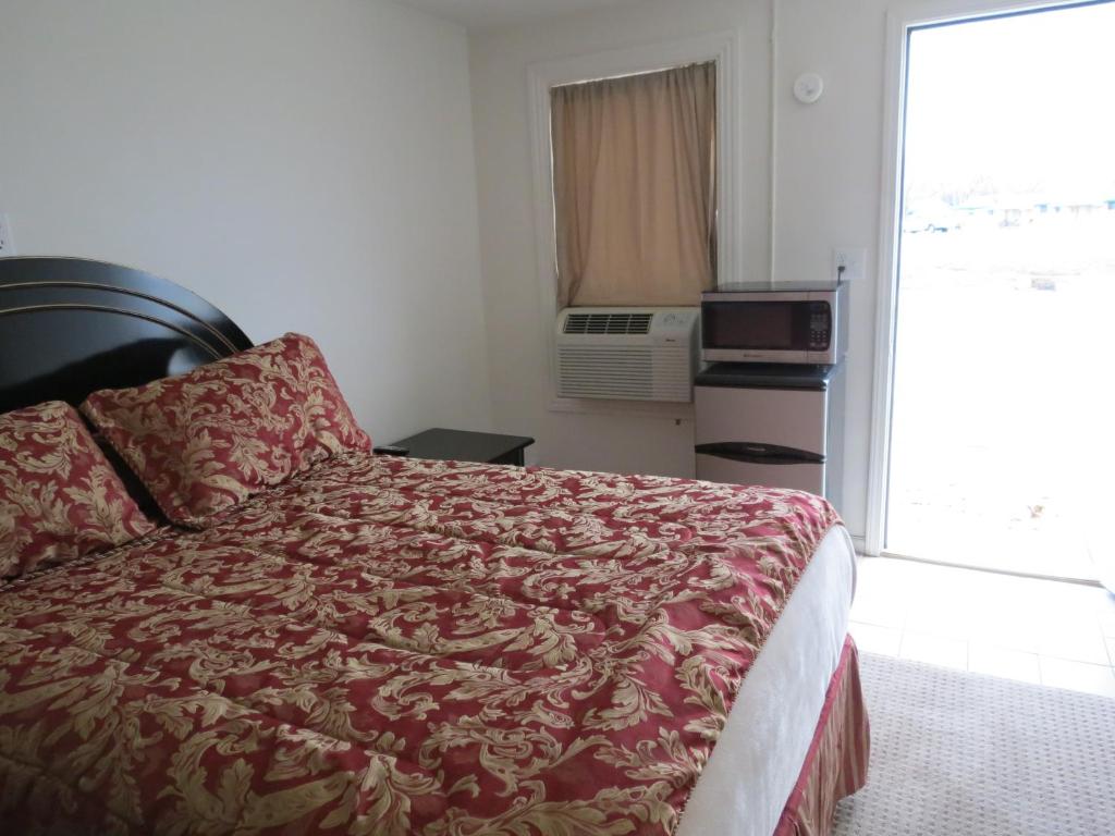 Postel nebo postele na pokoji v ubytování Best Inn Motel Salina