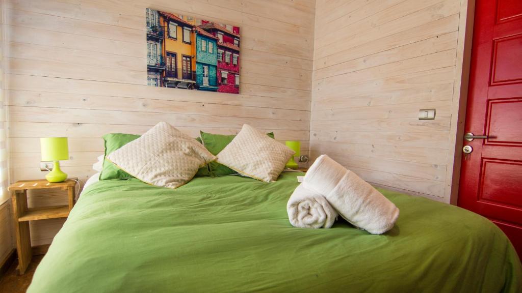 Postel nebo postele na pokoji v ubytování Comarca Lodge